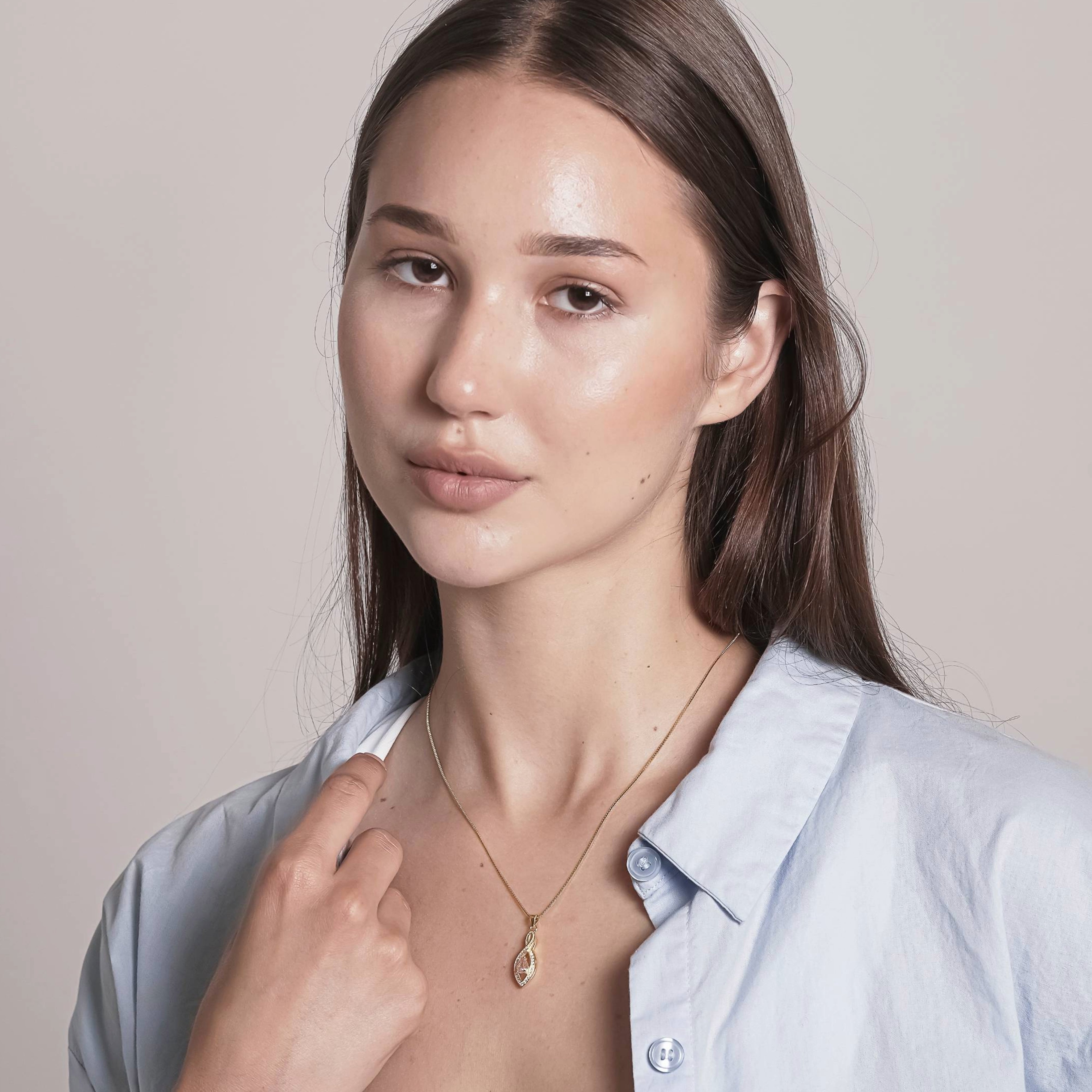 Gold Tone over Silver Infinity Necklace